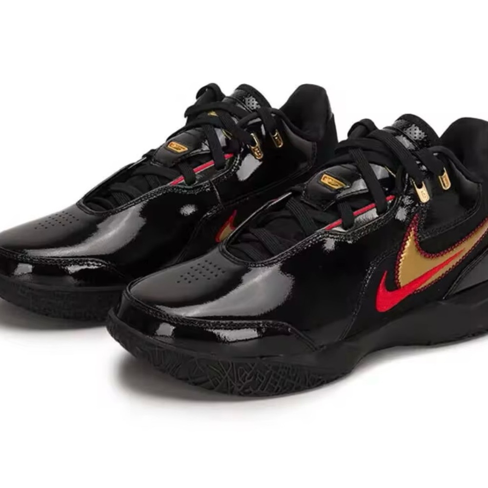 Nike Black Sneakers with Gold and Red Accents